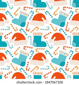 Merry Christmas and happy new year seamless pattern. Festive background with Christmas knitted sock, Santa Claus hat, candy cane, sweets. Xmas holiday  vector illustration in Scandinavian style