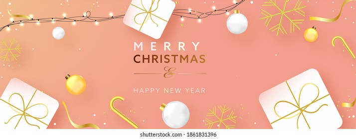 Merry Christmas and Happy New Year Text With Realistic Baubles, Gift Boxes, Snowflakes, Candy Canes And Lighting Garland On Peach Background.