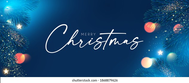 Merry Christmas and Happy New Year Holiday background with fir tree branches, bokeh effect and lights.