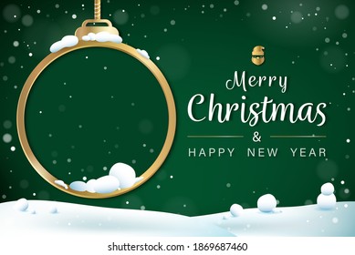 Merry Christmas and happy new year green background with snow and round empty space in bauble ball ornament 