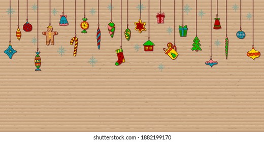 Merry Christmas and Happy New Year background with hand drawn doodle cartoon elements. Fir tree, balls and toys decorations, gift boxes, stars, snowflakes, gingerbread colorful icons on cardboard