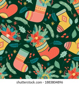 Merry Christmas and Happy New Year! Christmas holiday seamless pattern in vector. Festive composition of colorful socks for gifts and plant elements of poinsettia, holly, fir branches, red berries