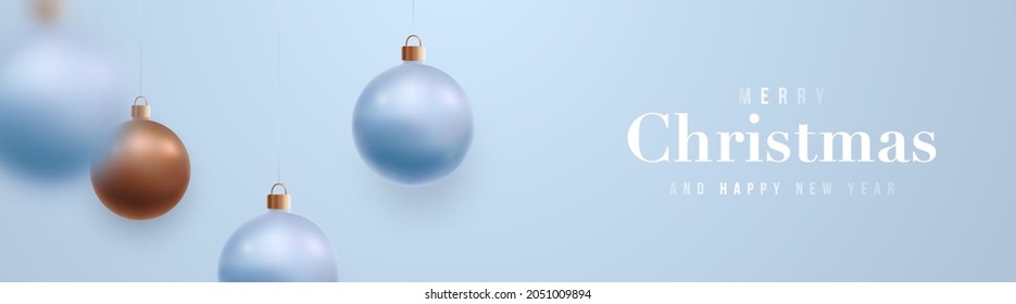 Merry Christmas and Happy New Year festive banner. Realistic blue and bronze color Christmas balls hanging light blue background. Xmas vector banner, social networks, web header.