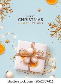 Merry Christmas and Happy New Year. Festive Xmas design realistic gift box, decorative objects. flat lay top view. Blue Christmas poster, holiday banner, flyer, stylish brochure, greeting card