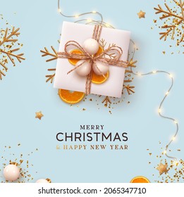 Merry Christmas and Happy New Year. Festive Xmas design realistic gift box, decorative objects. flat lay top view. Blue Christmas poster, holiday banner, flyer, stylish brochure, greeting card