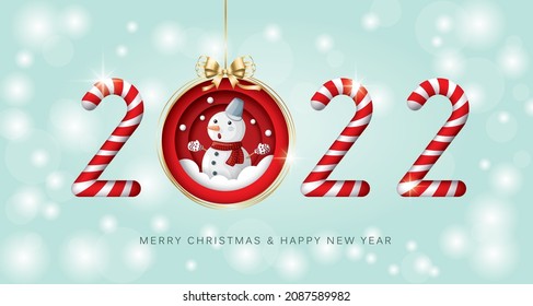 Merry Christmas and happy new year 2022 banner with candy cane, bauble and snowman on light green background.