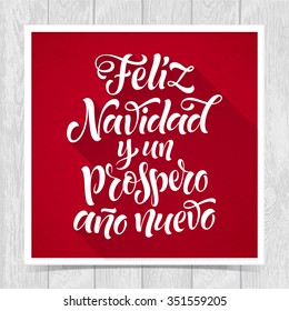 Merry Christmas and Happy New Year text in Spanish: Feliz Navidad y un Prospero Ano Nuevo. Vector lettering for invitation, greeting card, prints. Hand drawn inscription, calligraphic holidays design