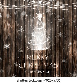 Merry Christmas and Happy new year. Christmas shiny tree with snowflakes, garland on the wooden table. Design template for flyer, banner, invitation, congratulation, poster design. Vector illustration