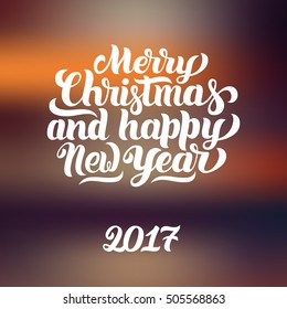 Merry Christmas and Happy New Year 2017 hand-lettering text. Handmade vector calligraphy on blurred christmas background