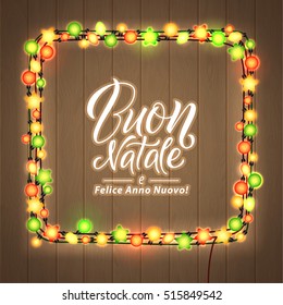 Merry Christmas and Happy New Year. Italian Language. Glowing Christmas Lights Wreath for Xmas Holiday Greeting Card Design. Wooden Hand Drawn Background.