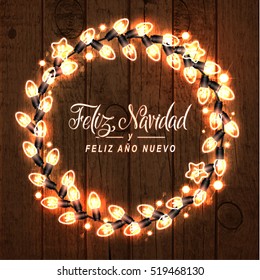 Merry Christmas and Happy New Year. Spanish Language. Glowing Christmas Lights Wreath for Xmas Holiday Greeting Card Design. Wooden Hand Drawn Background.