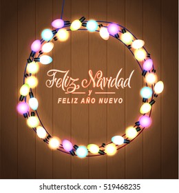 Merry Christmas and Happy New Year. Spanish Language. Glowing Christmas Lights Wreath for Xmas Holiday Greeting Card Design. Wooden Hand Drawn Background.