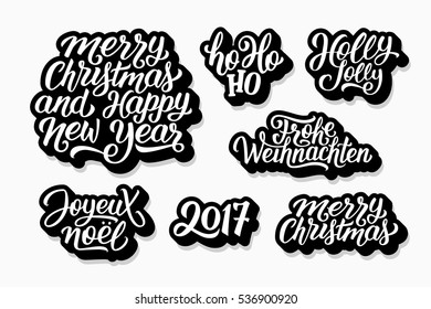 Merry Christmas and Happy New Year 2017 vector labels set with english, french and german greetings text. Holly jolly, Ho-ho-ho, Joyeux Noel and Frohe Weihnachten hand lettering on stickers.