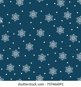 Merry Christmas and a Happy New Year! A set of seamless backgrounds with traditional symbols: snowflakes on a blue background. Vector illustration.