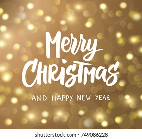 Merry Christmas and Happy New Year hand drawn text. Golden glowing sparkling lights background, bokeh effect. Holiday greetings quote. Great for Christmas and New year cards, party posters, gift tags.