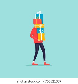 Merry Christmas and Happy new year. Guy carrying tall stack of gift boxes. Flat design vector illustration.