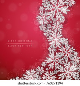 Merry Christmas and Happy New Year greeting card with silver glittering glowing snowflakes on red background