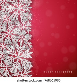 Merry Christmas and Happy New Year greeting card with silver glittering snowflakes frame on red glowing background. Elegant Christmas background