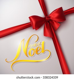 Merry Christmas. Joyeux Noel. Holiday Vector Illustration. Lettering Golden Composition With Ribbon And Red Bow