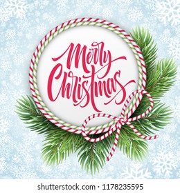 Merry Christmas lettering in circle rope frame. Xmas greeting with fir branches and striped bow. Merry Christmas calligraphy in round frame on snowflakes background. Poster design. Vector illustration