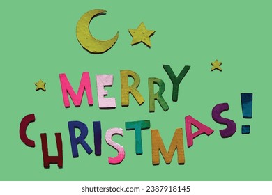 Merry Christmas lettering hand cut from cardboard.Fun acrylic painted letters.Isolated along with shadows on green background.New Year vector design for book,poster,card,label,header etc.