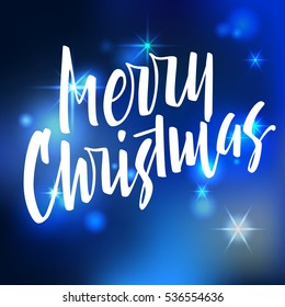 Merry Christmas lettering. Hand written Merry Christmas poster. Modern hand lettering on a blue sparkling background with stars