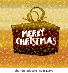 Merry Christmas lettering on black gift box. Gold holiday background 