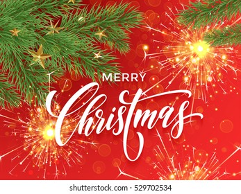 Merry Christmas lettering on decorative red background with golden sparklers, firework sparks. Sparkling Christmas ornament decorations of gold stars balls and Christmas tree branches.