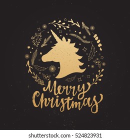 Merry christmas lettering with snowflakes, flowers and unicorn. Hand drawn festive card for your design. xmas unicorn design on shiny background.