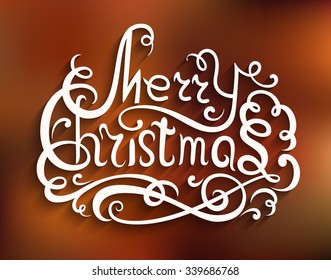 Merry Christmas lettering, vector calligraphic inscription with flourishes in retro style, cutout paper embellishment on blurred background, eps10