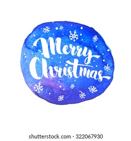 Merry Christmas lettering with white snow at artistic blue background. Vector greeting card with modern calligraphy. 