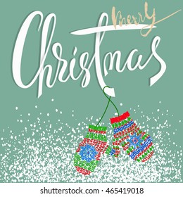 Merry Christmas. Modern calligraphy for Christmas cards and posters. Vector lettering with cute mitten pair. EPS10