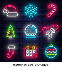 Merry Christmas neon icons collection. Christmas glowing neon icons, symbols and design elements. Collection of light signs, banners and signboards for New Year decoration. Vector