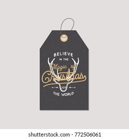 Merry Christmas and New Year gift tag. Holiday card concept with xmas symbols - deer. Believe in Christmas magic sign. Retro colors pallete. Stock Vector illustration isolated on white background.