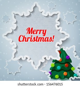 Merry christmas and new year greeting card with paper cut out snowflake, and picture of new year tree with toys on it. With craft paper texture
