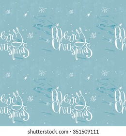 Merry christmas phrase on frosty blue seamless background