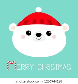 Merry Christmas. Polar white bear cub face round icon. Red hat. Happy New Year. Cute cartoon baby character. Arctic animal. Hello winter. Flat design. Hello winter. Blue background Vector illustration
