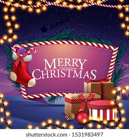 Merry Christmas, postcard with presents, Christmas stockings and beautiful landscape on the background