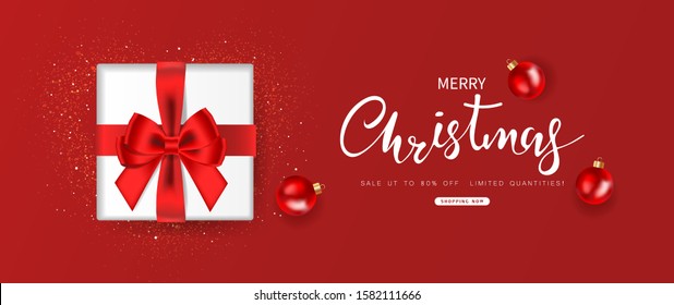 Merry Christmas sale. Gift box decorated with bow and ball design on red background. Top view. Vector illustration.