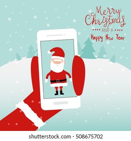 Merry christmas santa claus holding the smartphone hand lettering vector. illustration EPS10.