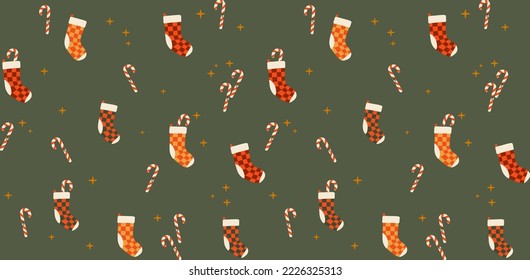 Merry Christmas seamless pattern. Cnady cane and stockings. Wrapping paper for gift