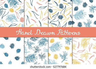 Merry Christmas! Set of seamless patterns with natural elements. The branches, pine cones, pine needles. Hand drawn. Vector illustration.