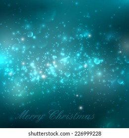 Merry Christmas. shiny blue (turquoise) holiday background with lights, sparkles and glitters