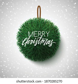 Merry Christmas sign, fir tree branches in a shape of a ball, realistic New Year decoration, vector illustration
