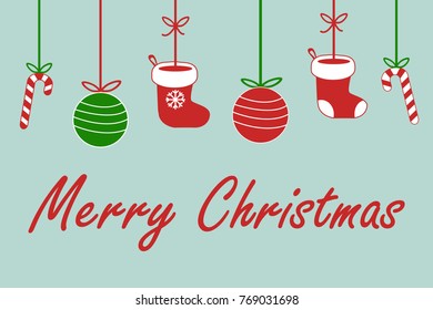 merry christmas sign text with santa claus socks, christmas ball and lolipop candy hanging on ribbon in red white and green on light blue background cute vector illustration