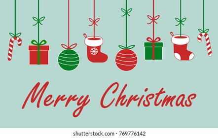 merry christmas sign text with santa claus socks, gift present christmas ball and lolipop candy hanging on ribbon in red white and green on light blue background cute vector illustration