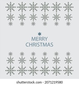Merry Christmas snow flacks arranged horizontally and star  with English typography in the centre on grayish white color  background.