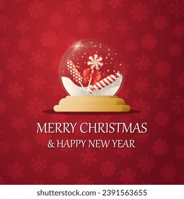 Merry christmas snow globe with a   Candies under the snow. New Year gift. Concept for holiday, winter holidays, New Year, Christmas