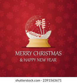 Merry christmas snow globe with a   Candies under the snow. New Year gift. Concept for holiday, winter holidays, New Year, Christmas