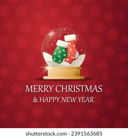 Merry christmas snow globe with a  Mittens and socks under the snow. New Year gift. Concept for holiday, winter holidays, New Year, Christmas